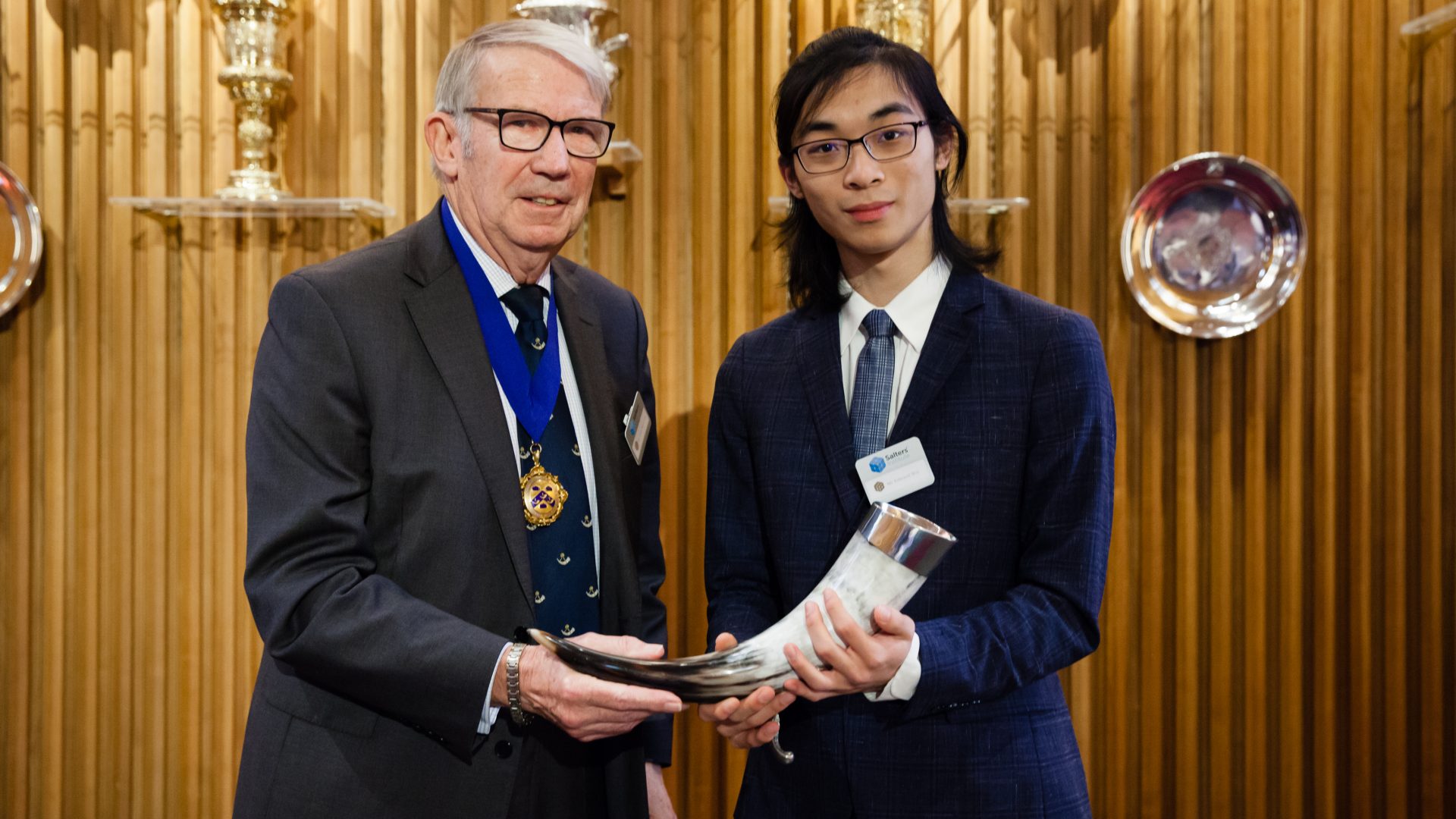Edward Wei receives the Salters-Horners Advanced Physics from John Edmund MacCabe, Master of The Horners' Company.